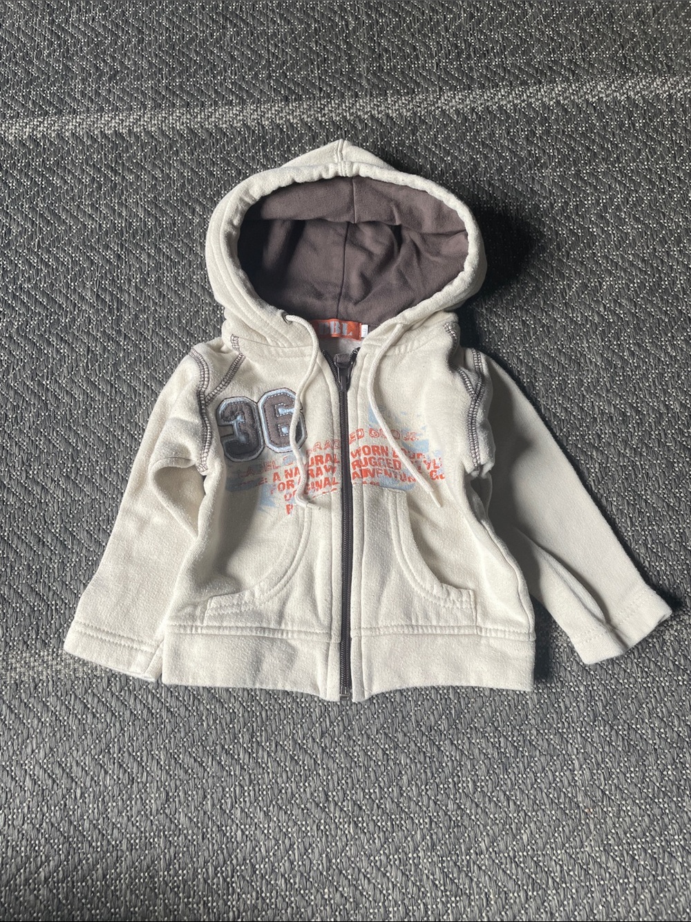 Cream Hoodie with Brown Hood Lining and Blue Graphic